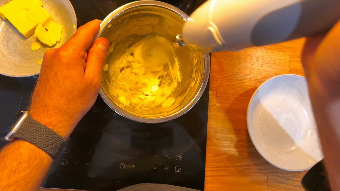 Soft butter beaten into the cooled pudding